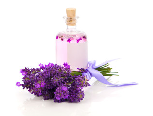 Obraz na płótnie Canvas fresh lavender blossoms with Natural handmade lavender oil, on w