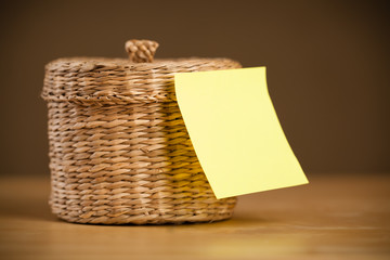 Empty post-it note sticked on jewelry box