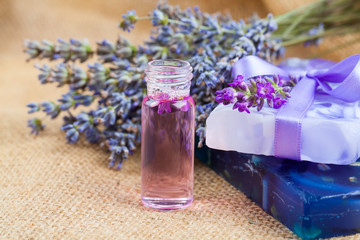 Obraz na płótnie Canvas Natural handmade lavender Liquid soap and solid soap with fresh