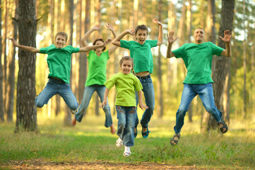 Happy cheerful family running