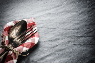 Table setting with vintage spoon and fork - obrazy, fototapety, plakaty