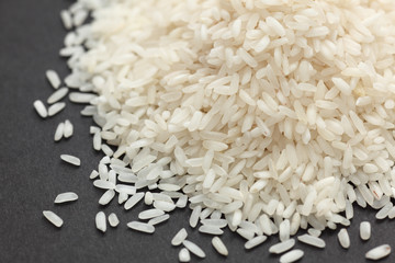 Rice heap on a black background