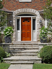 Fototapeta na wymiar house front door with flagstone steps