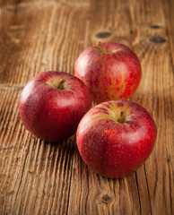Fresh harvested apples on wood