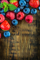 Blueberries, raspberries, strawberries.Garden and forest fruits 