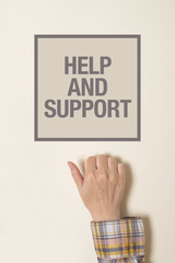 Hand is knocking on help And Support door