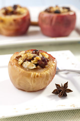 Baked apples with nuts and raisins