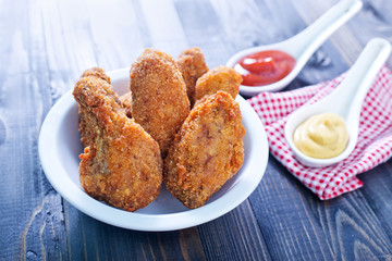 fried chicken wings with sauce