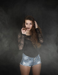 curly hair model smoking cigar
