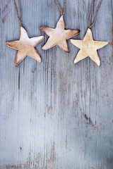 Fototapeta na wymiar stars hanging on wooden board