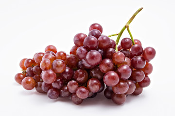 Fresh red grapes isolated on white background.