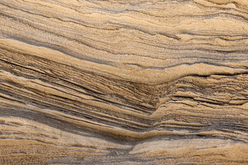 texture of golden lines of loose rock