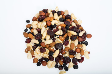 mixed nuts and dried fruits isolated on white background