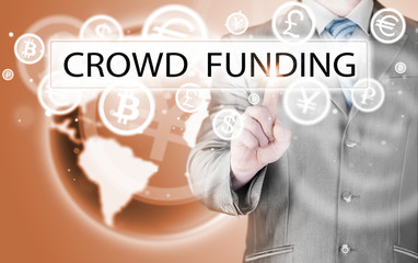 Businessman pushes virtual crowd funding button