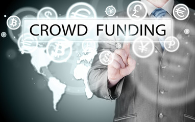 Businessman pushes virtual crowd funding button
