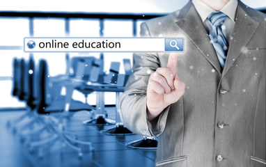 Online education written in search bar on virtual screen.