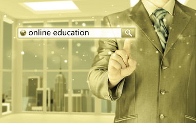 Online education written in search bar on virtual screen.