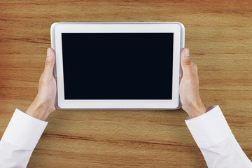 Businessman hand holding digital tablet