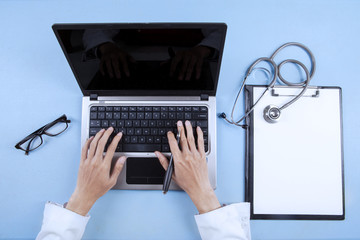 Doctor typing on keyboard 1