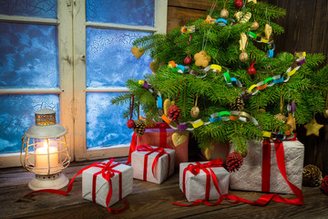Warm cottage in winter Christmas evening