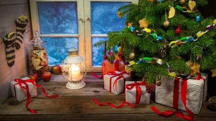 Christmas eve in warm and cozy rustic cottage