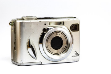 old compact camera on white background