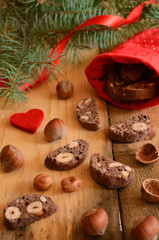 Fototapeta na wymiar Xmas decoration with chocolate biscotti and pine twigs