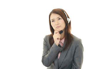 疲れた表情のオペレーター