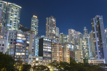 Fototapeta na wymiar residential buildings in Hong Kong at night
