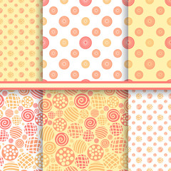 Polka dot set of seamless vector patterns in warm yellow colors