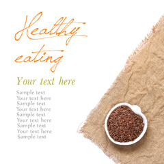 Red organic rice in bowl isolated on white