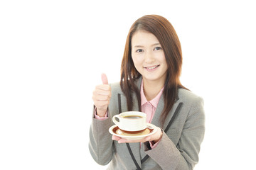 コーヒータイムを楽しむ女性