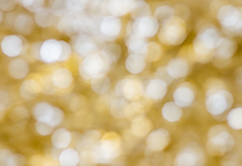 Obraz premium Gold christmas lights background. Blurry