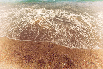 Wave sea and rocks on beach