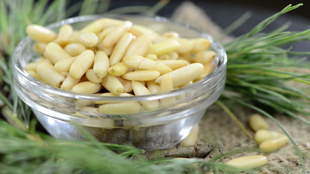 Heap of rotating Pine Nuts (loopable full HD video)