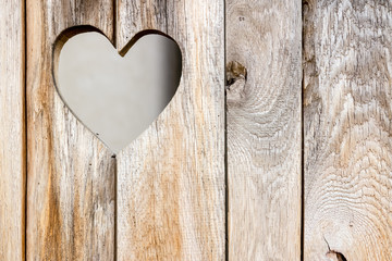 The wooden door with heart. Background