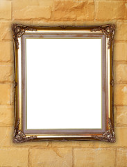 golden frame on brick stone wall