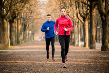 Fotobehang Couple jogging together © Martinan