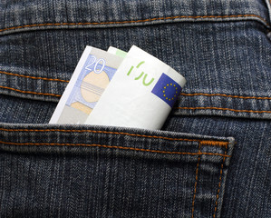 European currency banknotes in jeans pocket one hundred and twen