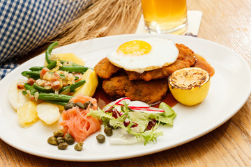Wiener Schnitzel with Potatoes and Fresh Vegetables
