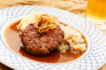 beef cutlet with mashed potatoes and cabbage