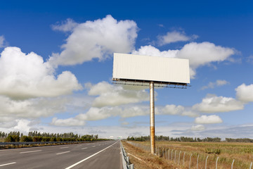 Blank billboard by the highwa