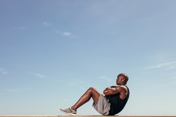 Fitness model doing crunches