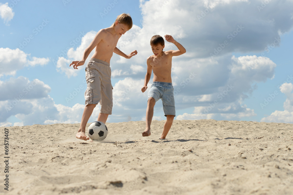 Poster Brothers playing football