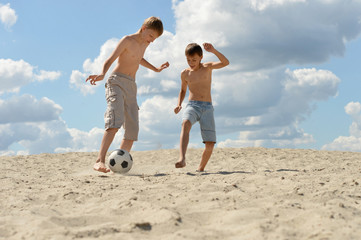 Brothers playing football