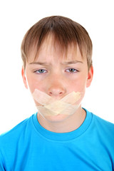 Sad Kid with Sealed Mouth