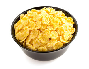 corn flakes in bowl  on white