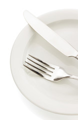 knife and fork on white