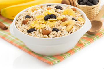 bowl of cereals muesli on white