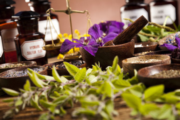 Medicine bottles and herbs 